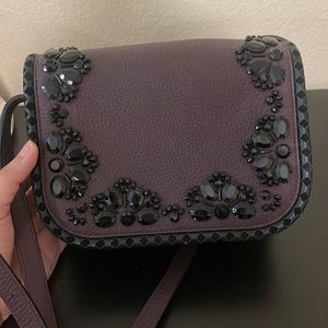 Purple Kate spade bag with studs. Never used.